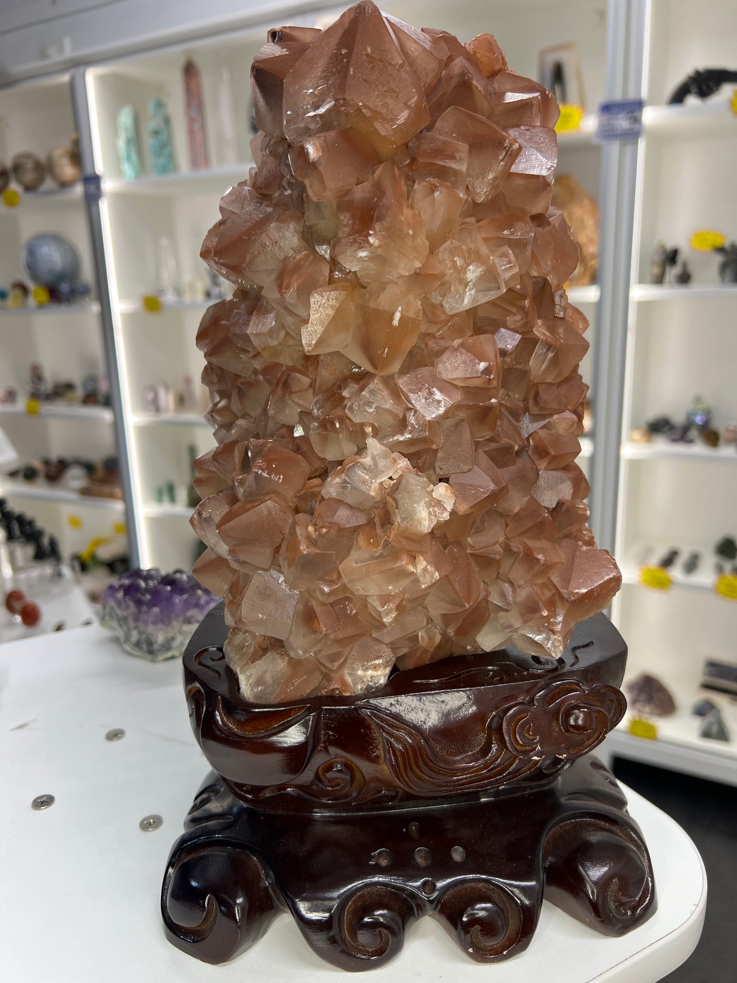 Red Calcite Cluster on Wooden Stand