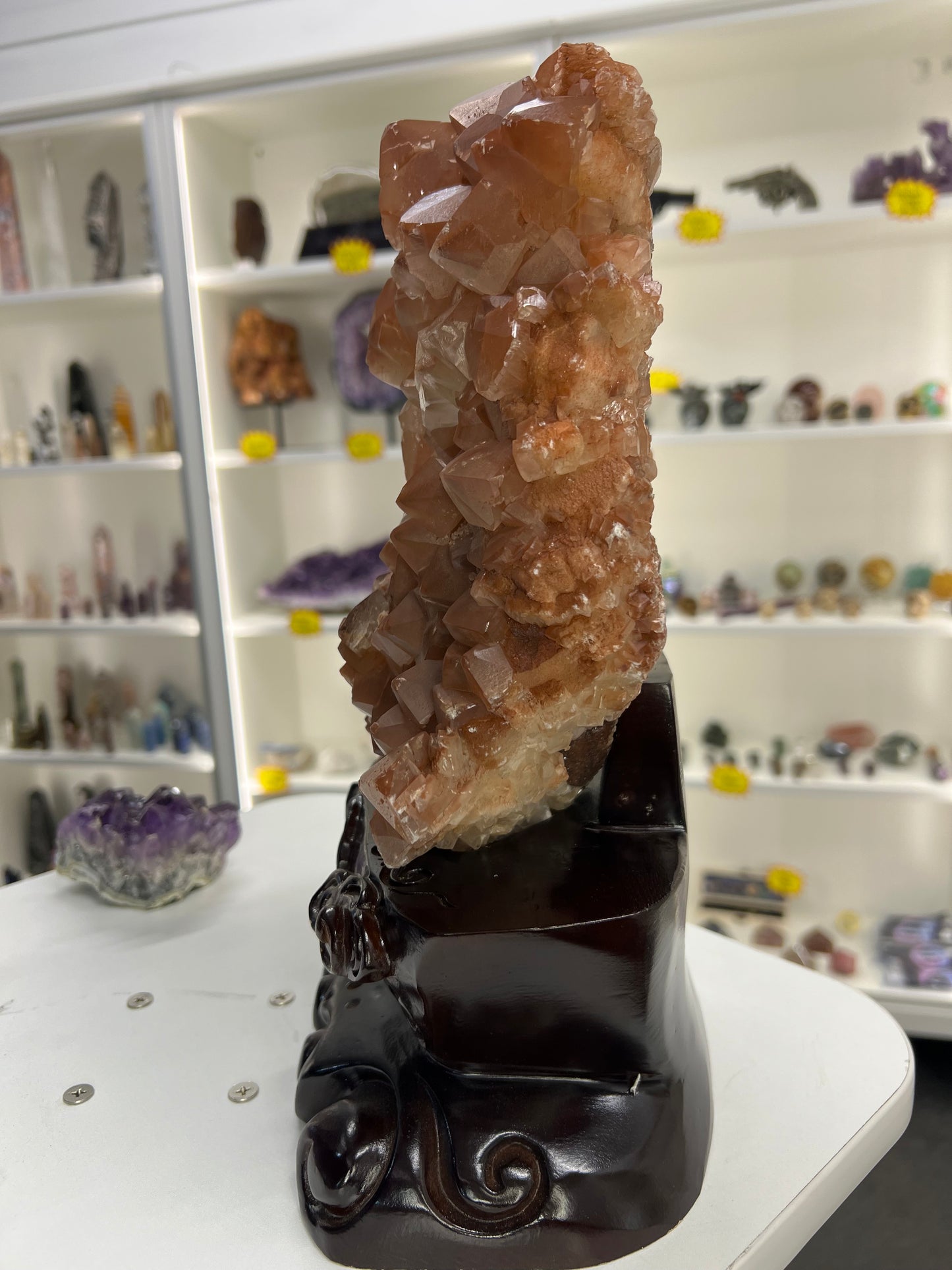 Red Calcite Cluster on Wooden Stand