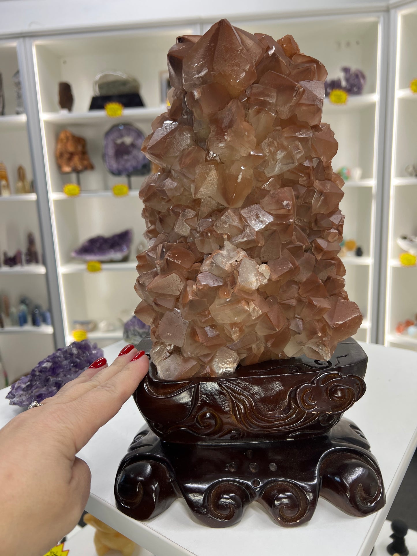 Red Calcite Cluster on Wooden Stand