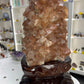 Red Calcite Cluster on Wooden Stand