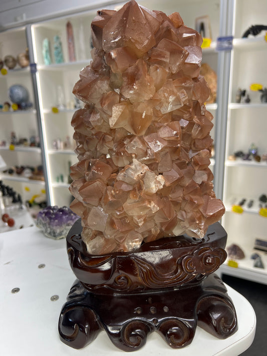 Red Calcite Cluster on Wooden Stand