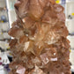 Red Calcite Cluster on Wooden Stand
