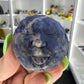 Sodalite Moon Face Sphere on Stand